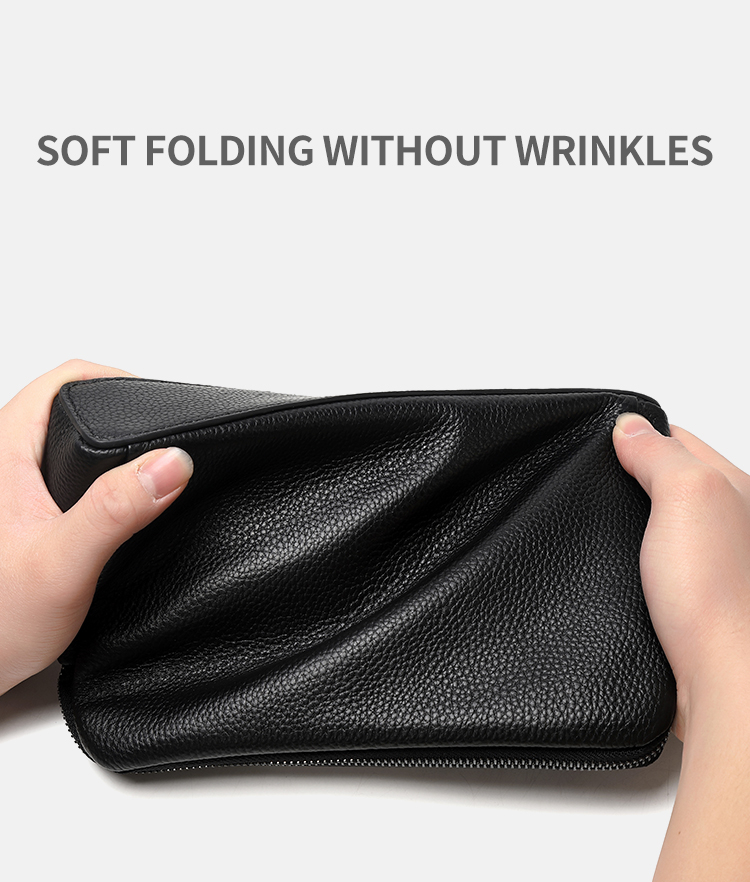 Hands demonstrating clutch material flexibility